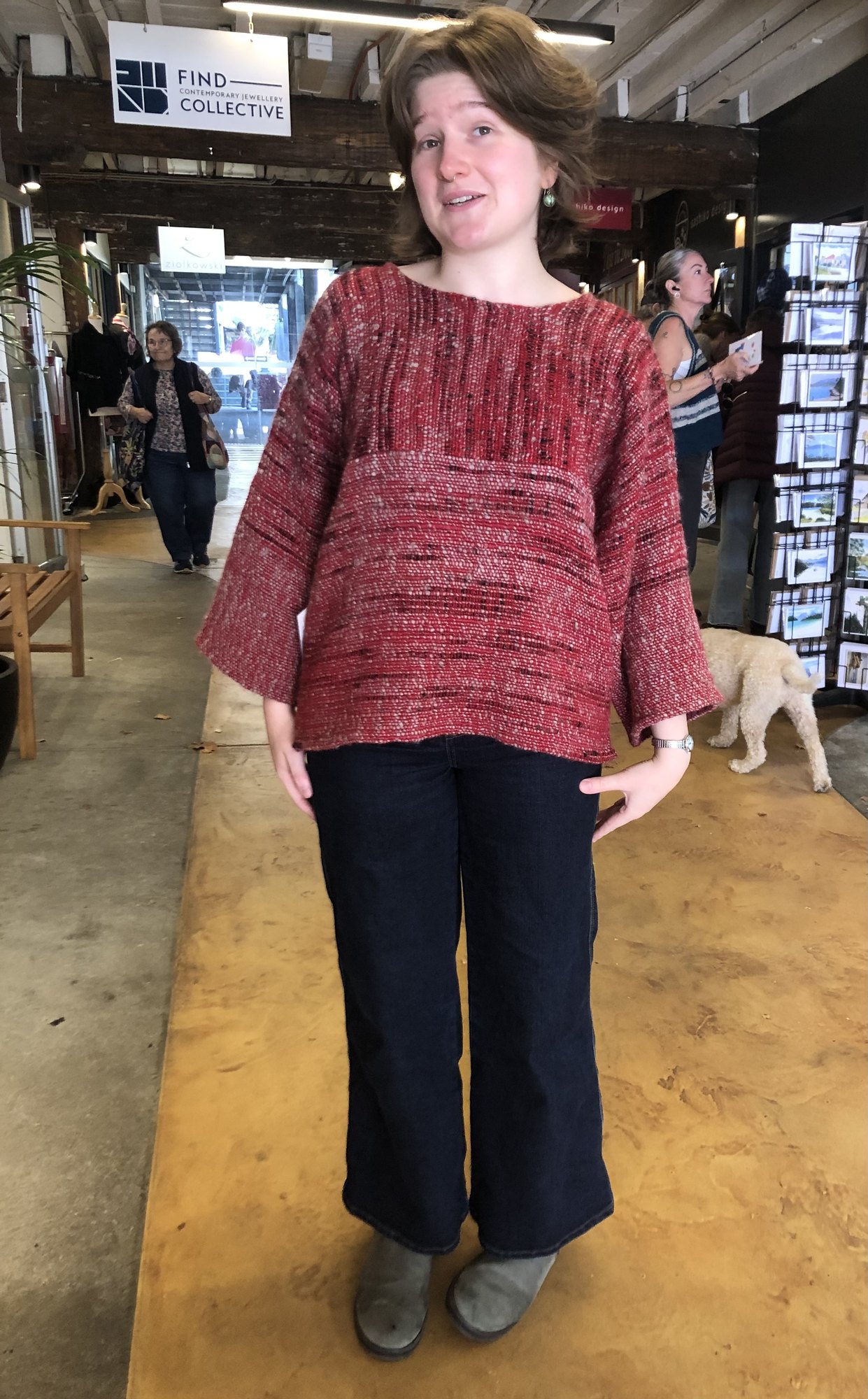 A boxy top with wide sleeves in raspberry and deep pink.